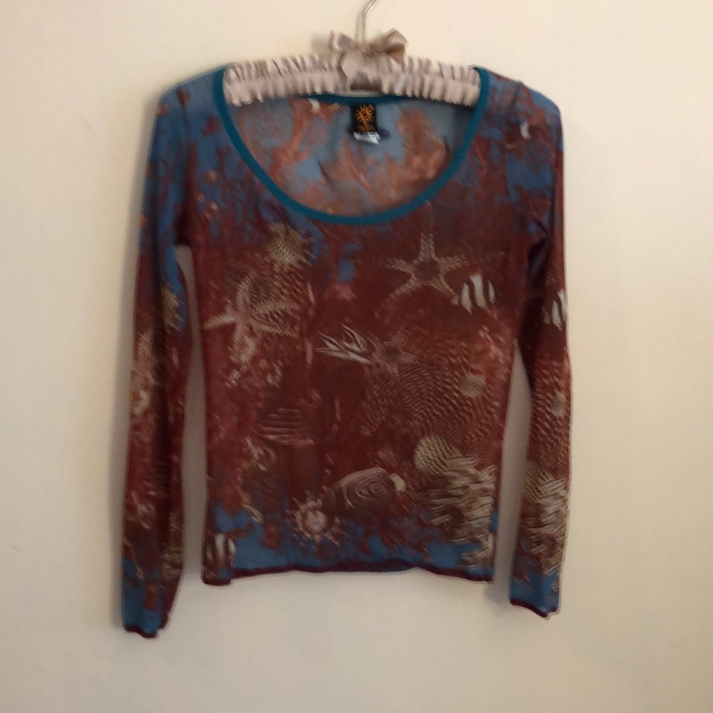 Suit. Made in Italy. Very light top with a long sleeve